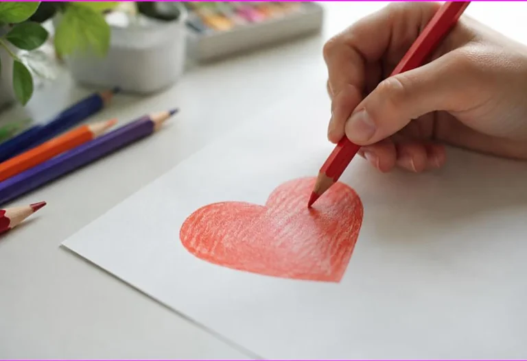 Hand filling a simple heart with even colored pencil strokes, coloring techniques for beginners